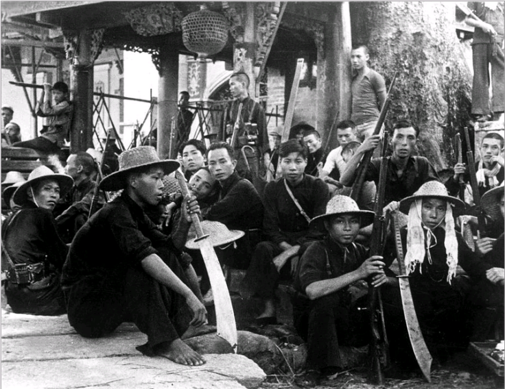 chinese-guerillas-chinese-guerillas-who-are-fighting-against-the-japanese-armed-with-big-swords-as-well-as-rifles-rest-near-canton-everett-collection
